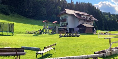 Urlaub auf dem Bauernhof - direkt an der Skipiste - Chalets und Apartments Hauserhof