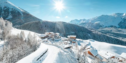 Urlaub auf dem Bauernhof - Eislaufen - Tirol - Der Veitenhof im Winter - Bio und Reiterhof der Veitenhof