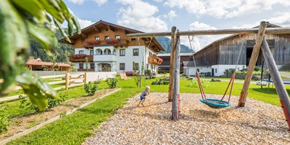 Urlaub auf dem Bauernhof - Fahrzeuge: Bagger - Salzburg - Spielplatz - Ausserraingut