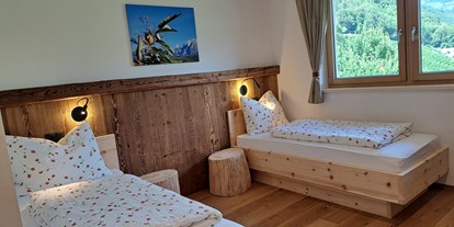 Urlaub auf dem Bauernhof - Mithilfe beim: Heuernten - Trentino-Südtirol - Schlafzimmer der Wohnung Castanea - Pignathof 