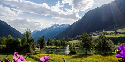 Urlaub auf dem Bauernhof - Schwimmmöglichkeit: Schwimmteich - Tirol - Blick zum angrenzenden See. - Jedelerhof