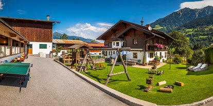 Urlaub auf dem Bauernhof - Fahrzeuge: Futtermischwagen - Salzburg - Bio-Bauernhof Schweizerhof