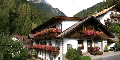 Urlaub auf dem Bauernhof - Eislaufen - Tirol - KASSNHOF