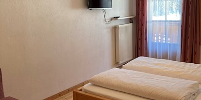 Urlaub auf dem Bauernhof - Mithilfe beim: Melken - Italien - Zimmer Appartement "Mareiter Stein" - Schneiderhof