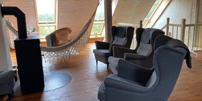 Urlaub auf dem Bauernhof - Lychen - Lassen Sie den Tag in einer unserer Hängematten oder im gemütlichen Sessel am Kaminofen ausklingen - Pasterhof Eichhorst