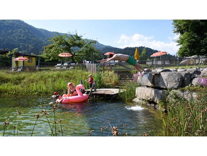 Urlaub auf dem Bauernhof - Aufenthaltsraum - Alpen - Schwimmteich - Feriengut Unterhochstätt
