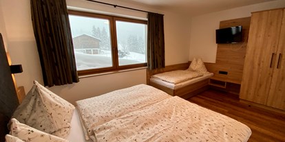 Urlaub auf dem Bauernhof - Preisniveau: moderat - Salzburg - Schlafzimmer - Appartement 1 - Finkhof Appartements