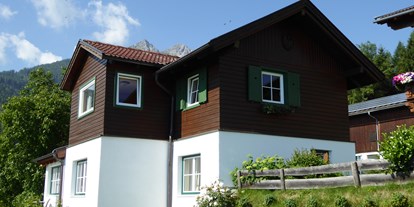 Urlaub auf dem Bauernhof - Mithilfe beim: Heuernten - Tirol - In diesem kleine Häuschen befinden sich die Wohnungen. - Nockhof